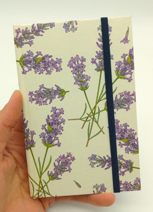 CAHIER RIGIDE AVEC ELASTIQUE 10,5*15 CM